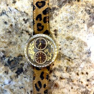 Animal print gold guess watch